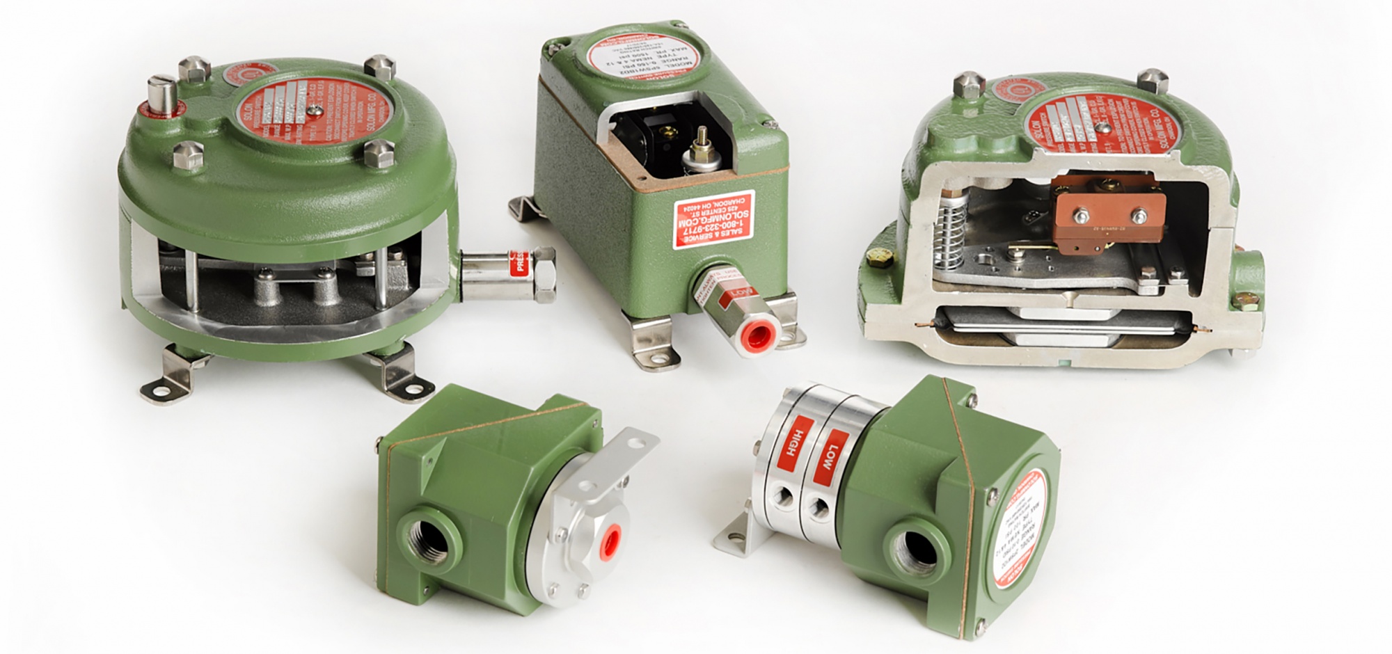 A group of green catalog pressure switches